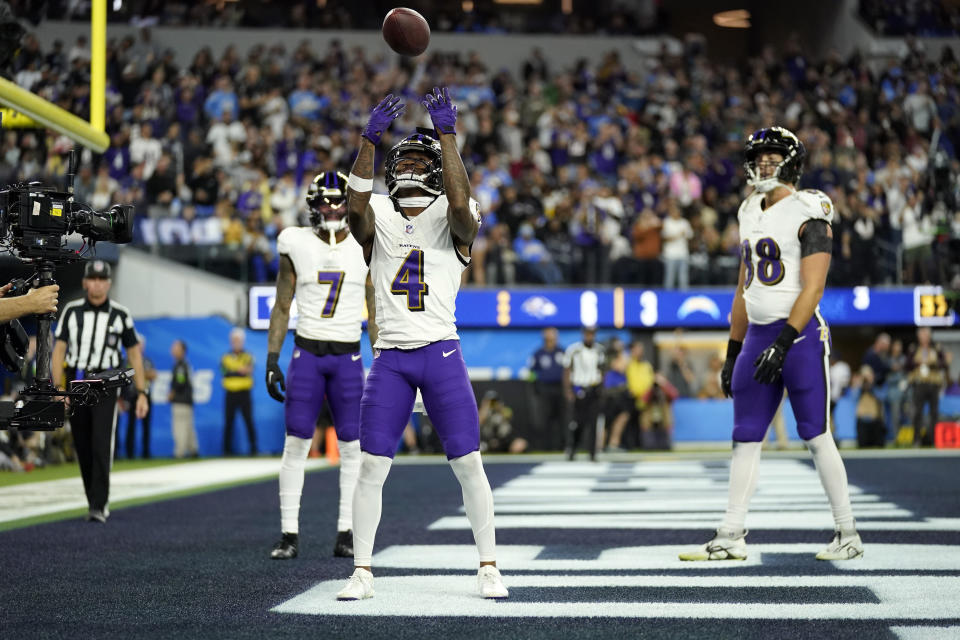 Baltimore Ravens wide receiver Zay Flowers (4) celebrates after his touchdown catch against the Chargers. (AP Photo/Ashley Landis)