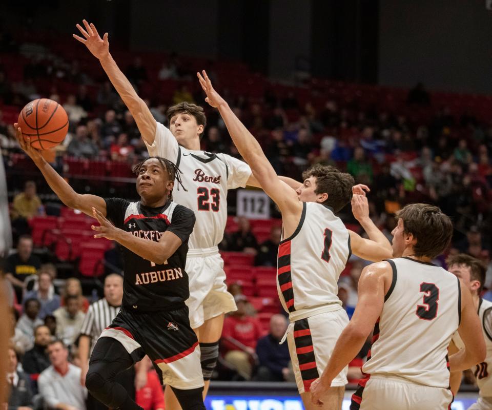 Auburn's Amir Danforth goes up against Benet Academy on Monday, March 6, 2023, at Northern Illinois University in DeKalb.