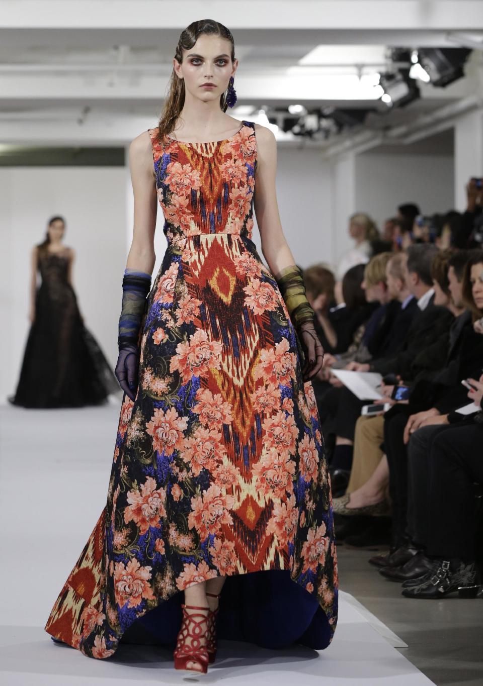 Fashion from the Oscar de la Renta Fall 2013 show is modeled during Fashion Week in New York, Tuesday, Feb. 12, 2013. (AP Photo/Kathy Willens)