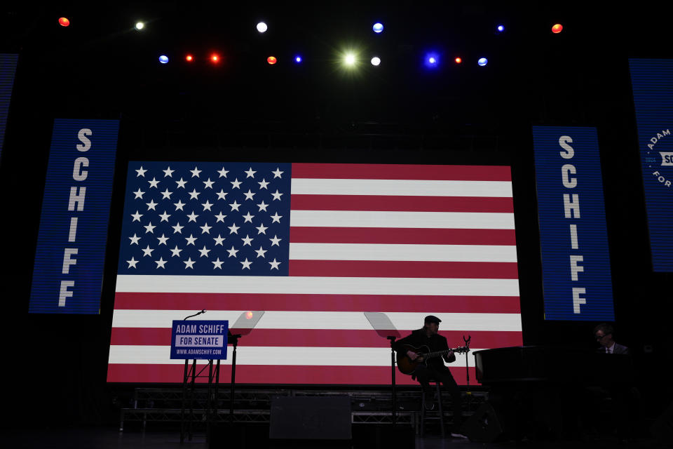 A musician rehearses during a watch party for U.S. Rep. Adam Schiff, D-Calif., a U.S Senate Candidate, Tuesday, March 5, 2024, in Los Angeles. (AP Photo/Jae C. Hong)