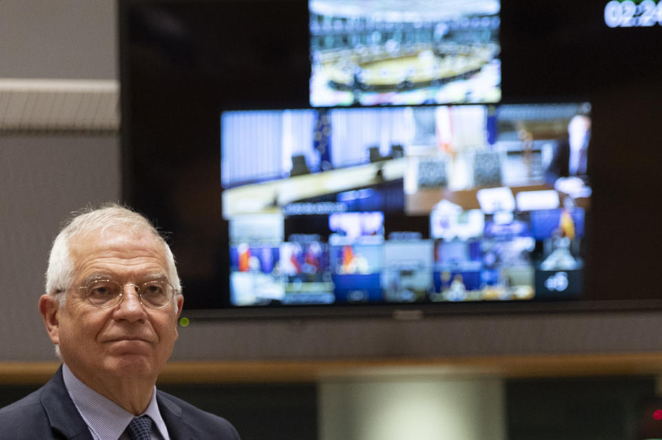 FILE - In this Monday, June 15, 2020 file photo, European Union foreign policy chief Josep Borrell arrives for a video conference at the European Council building in Brussels. The leaders of Serbia and Kosovo resumed talks Sunday, July 12, 2020, via video conference with European Union foreign policy chief Josep Borrell in Brussels, aimed at normalizing their long-strained relations, more than 20 years after Belgrade sent troops into its former territory to crush an uprising by ethnic Albanian separatists. (AP Photo/Virginia Mayo, Pool, File)