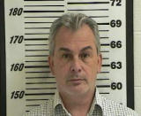 Michael Taylor, who was implicated in enabling the dramatic escape of former Nissan Motor Co boss Carlos Ghosn, is seen in a booking photograph from October 24, 2012 on unrelated charges