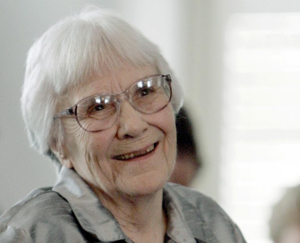 FILE - In this Aug. 20, 2007, file photo, author Harper Lee smiles during a ceremony honoring the four new members of the Alabama Academy of Honor at the Capitol in Montgomery, Ala. A group in the south Alabama city of Monroeville hopes to develop new attractions and draw more tourists to the hometown of the late "To Kill a Mockingbird" author. (AP Photo/Rob Carr, File)