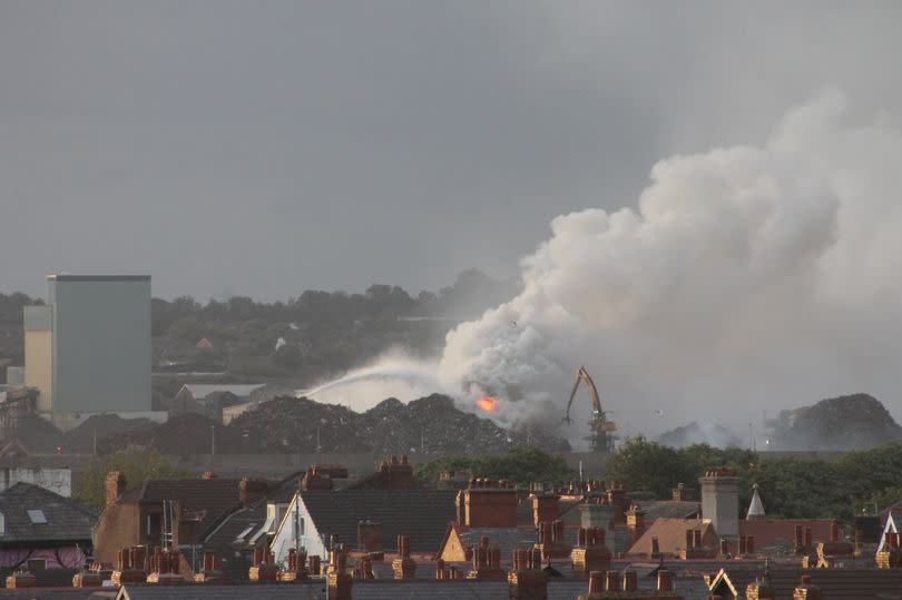 The Canada Dock fire from the Wirral-side of the river.