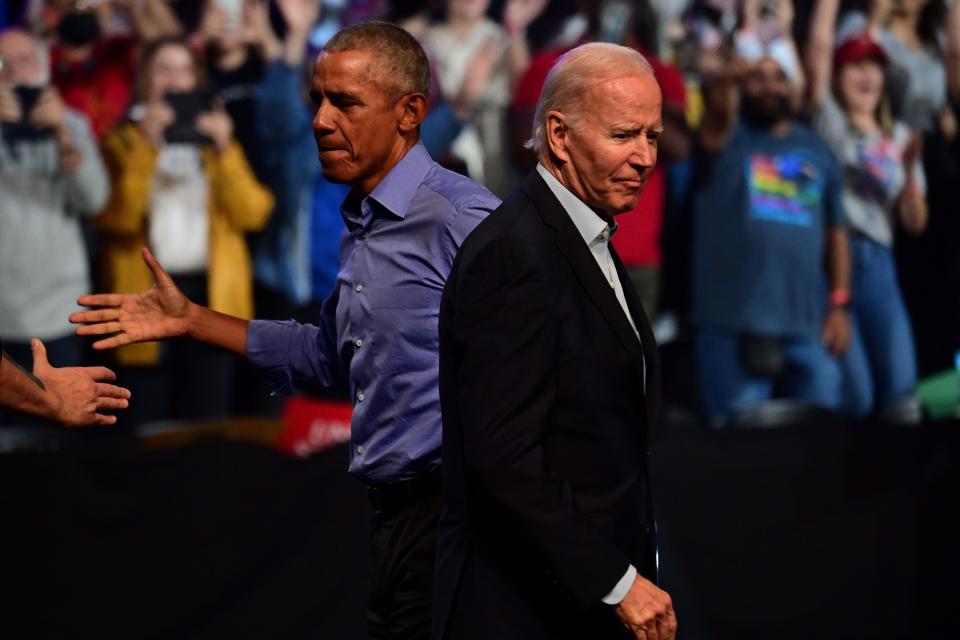 President Joe Biden and former President Barack Obama campaign on Nov. 5, 2022, in Philadelphia.