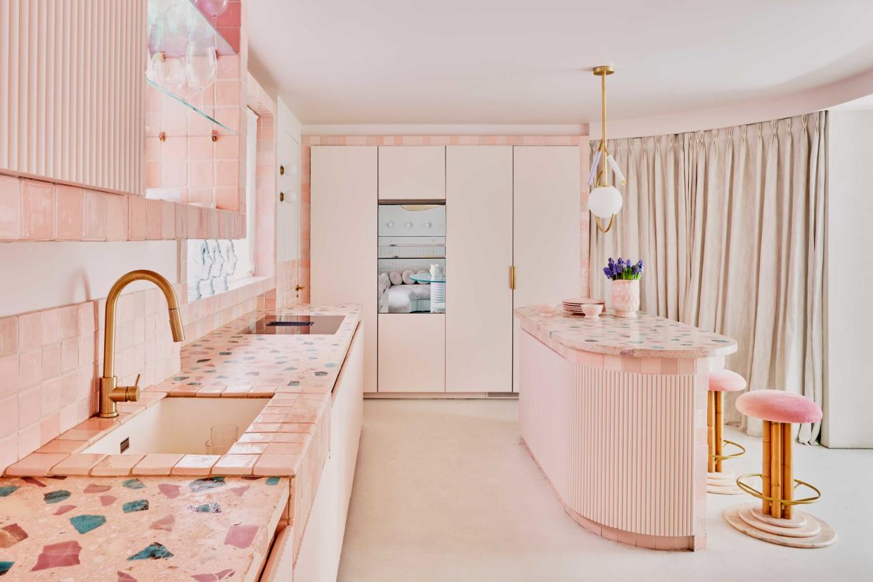  an all pink kitchen with terrazza countertops 