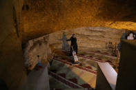 An employee of the Jordanian Waqf, or Islamic trust, that oversees the area, cleans during preparations ahead of the Muslim holy month of Ramadan, in the Dome of the Rock located on the compound known to Muslims as al-Haram al-Sharif and to Jews as Temple Mount, in Jerusalem's Old City, April 19, 2017. REUTERS/Ammar Awad