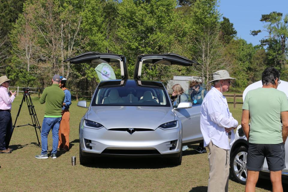 Teslas and other electric vehicles were on display at a Sustainability Summit.