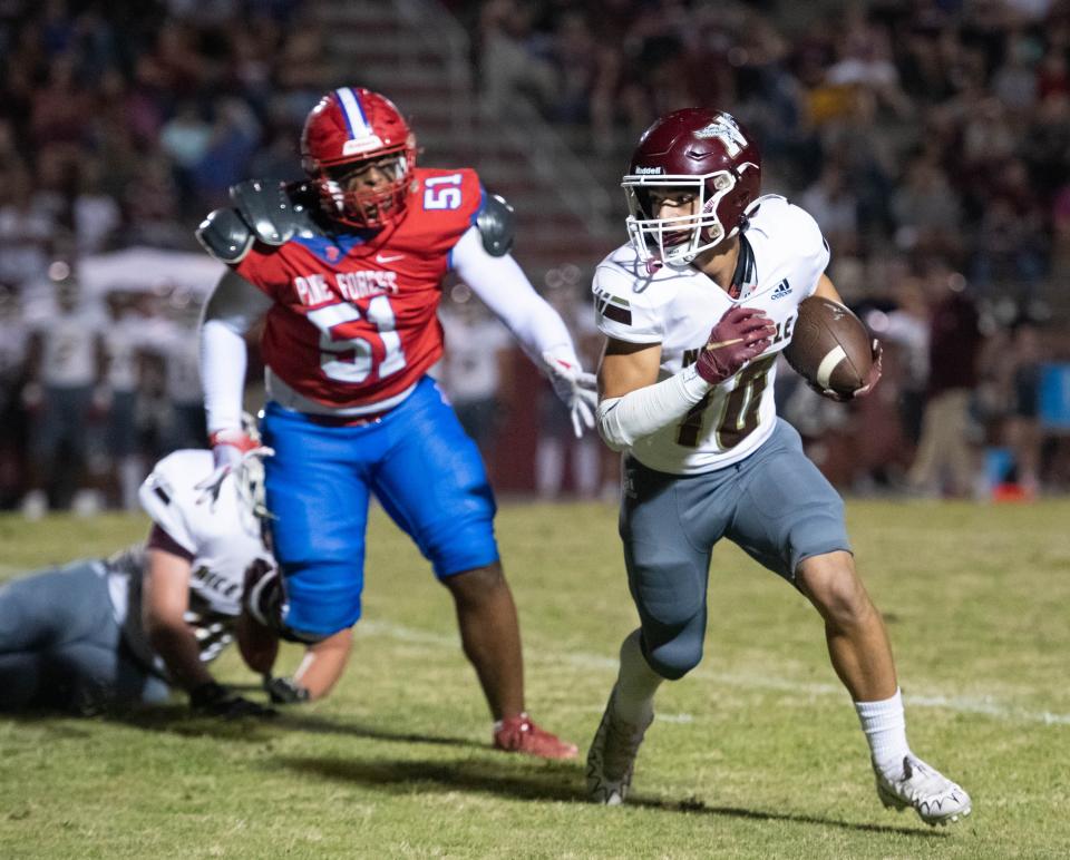 Deangelo Shorts (10) carries the ball during the Niceville vs Pine Forest football game at Pine Forest High School in Pensacola on Friday, Oct. 7, 2022.