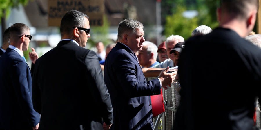 Slovak PM Robert Fico communicates with people shortly before he was shot