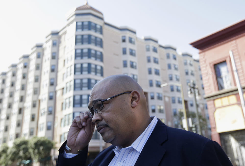 FILE - Mohammed Nuru, then-director of San Francisco Public Works, is interviewed at the Tenderloin Pit Stop mobile bathrooms in San Francisco on March 19, 2015. San Francisco's former public works director, who pleaded guilty to steering public contracts and taking pricey gifts, was sentenced Thursday to seven years in prison in a corruption case that ensnared several City Hall officials and insiders. (AP Photo/Jeff Chiu, File)