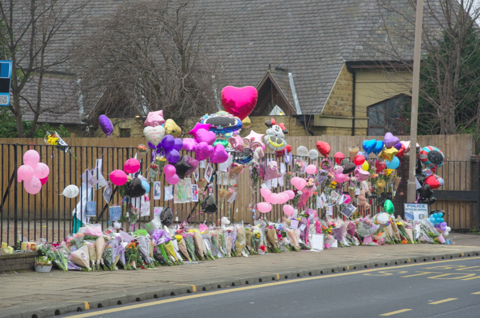 Tributes left at the scene of the crash after Katelyn's death (SWNS)