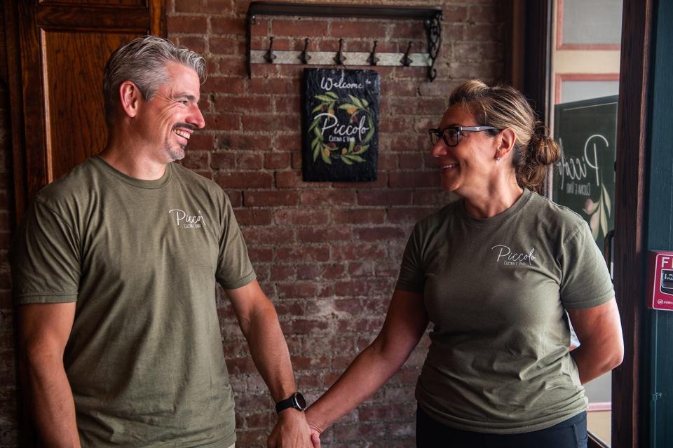 Dave Madden and Anna Madden, owners of Piccolo Cucina e Vino, in their Middletown restaurant.