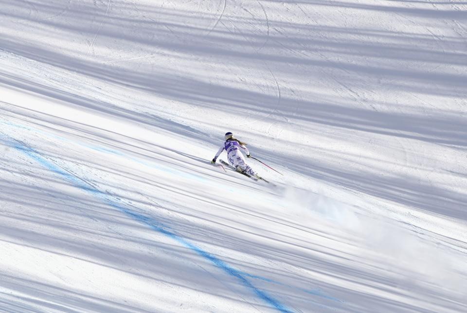 United States' Lindsey Vonn competes during an alpine ski, women's World Cup downhill in Cortina D'Ampezzo, Italy, Saturday, Jan. 19, 2019. (AP Photo/Marco Trovati)