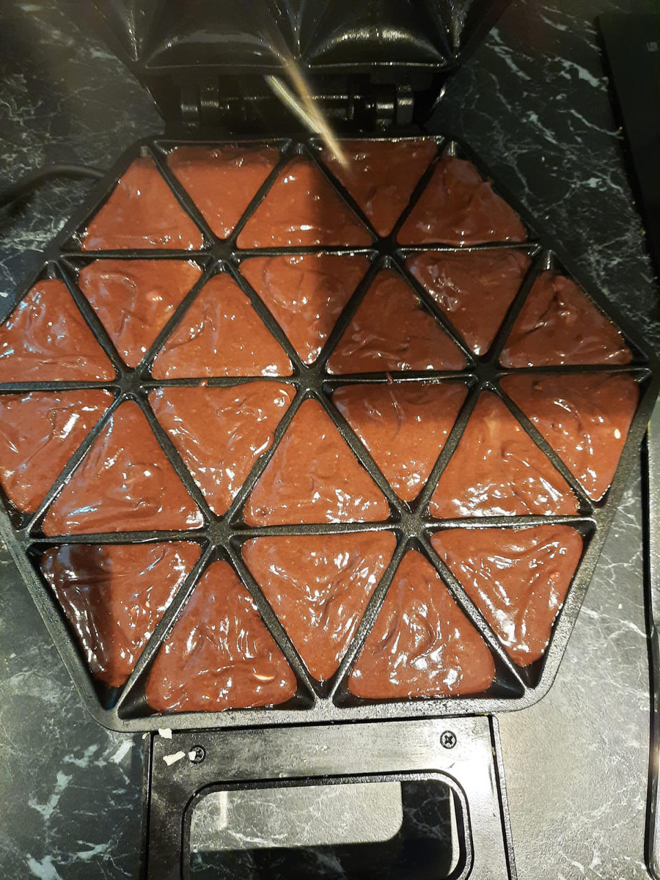 Chocolate muffin batter in a samosa maker