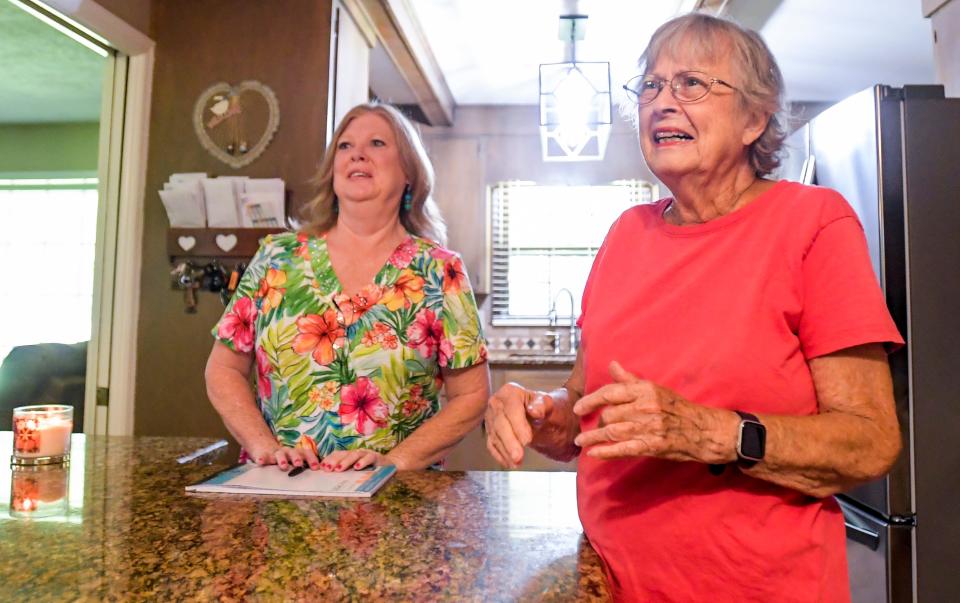 Mary Alston, left, and Beverly Roberts, right, talk about  helping feral cats.in Wetumpka, Ala., on Friday June 30, 2023.