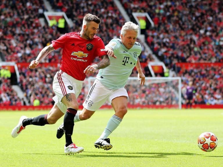 Follow our live coverage as Manchester United Legends lead against Bayern Munich Legends in the 1999 Treble Reunion game at Old Trafford this afternoon, which is raising money for the Manchester United Foundation.The United team includes a host of names from the team which won the Champions League on that famous night in Barcelona 20 years ago, including David Beckham, Peter Schmeichel and the club's current manager and hero that night, Ole Gunnar Solskjaer, while Sir Alex Ferguson will be in the dugout, and Solskjaer scored the opener before Dwight Yorke's volley made it two.Plenty of famous faces are in the away dressing room too, including Lothar Matthaus, Ze Roberto and the man who memorably punched the Nou Camp turf in despair that night, Sammy Kufour. Follow it live:Please allow a moment for the blog to load. United squad1 Peter Schmeichel (Goalkeeper)2 Gary Neville (Defender)3 Denis Irwin (Defender)4 David May (Defender)5 Ronny Johnsen (Defender)6 Jaap Stam (Defender)7 David Beckham (Midfielder)8 Nicky Butt (Midfielder)9 Andy Cole (Striker)9 Louis Saha (Striker)10 Teddy Sheringham (Striker)13 Ji-sung Park (Midfielder)14 Karel Poborsky (Midfielder)15 Jesper Blomqvist (Midfielder)17 Raimond van der Gouw (Goalkeeper)18 Paul Scholes (Midfielder)19 Dwight Yorke (Striker)20 Ole Gunnar Solskjaer (Striker)21 Henning Berg (Defender)24 Wes Brown (Defender)27 Mikael Silvestre (Defender)34 Jonathan Greening (Midfielder) Bayern squad2 Markus Babbel (Defender)3 Hans Pfluger (Defender)4 Sammy Kuffour (Defender)5 Klaus Augenthaler (Defender)5 Daniel van Buyten (Defender)6 Martin Demichelis (Defender)6 Christian Nerlinger (Midfielder)7 Michael Sternkopf (Midfielder)8 Markus Schupp (Midfielder)9 Luca Toni (Striker)9 Giovane Elber (Striker)10 Lothar Matthaus (Midfielder)10 Roy Makaay (Striker)11 Stefan Effenberg (Midfielder)11 Ze Roberto (Midfielder)11 Ivica Olic (Striker)13 Paulo Sergio (Striker)14 Carsten Lakies (Striker)16 Andreas Ottl (Midfielder)16 Marcel Witeczek (Midfielder)17 Thorsten Fink (Midfielder)19 Carsten Jancker (Striker)22 Bernd Dreher (Goalkeeper)22 Hans-Jorg Butt (Goalkeeper)