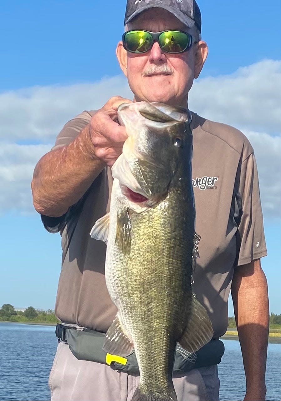 Mulberry’s Danny Hamm caught this 8-pound bass in the Fin and Feather Pit south of Mulberry.