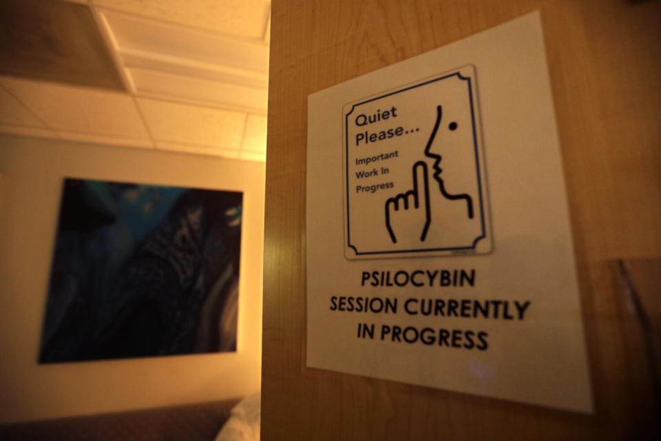 A sign reads "Quiet Please ... Psilocybin Session Currently in Progress"