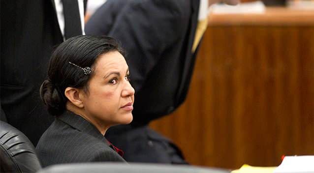 Ana Lilia Trujillo, left, sits in the courtroom before opening arguments in her trial. Photo: AP.