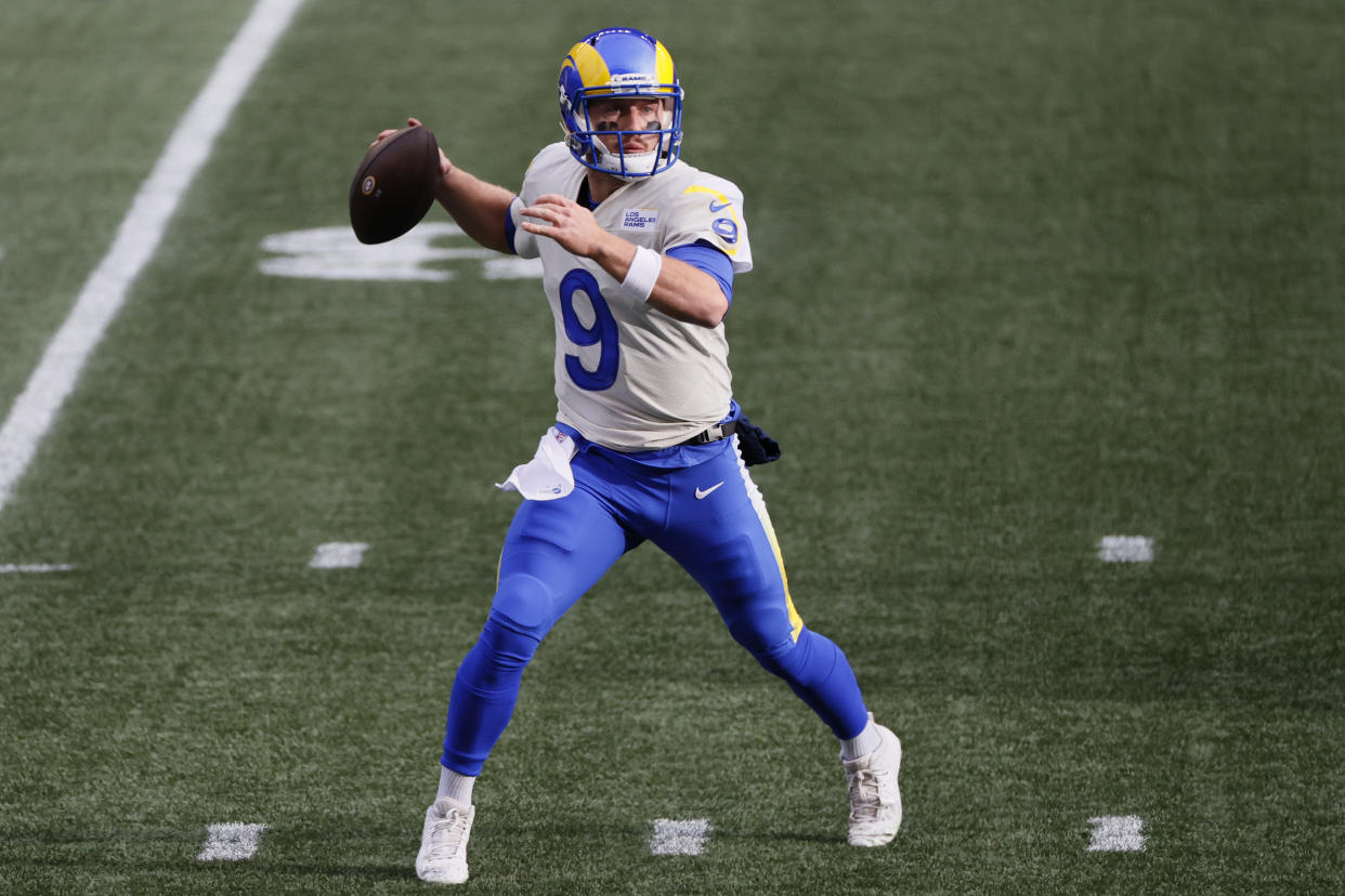 Quarterback John Wolford left with an injury in the first quarter of the Rams' wild-card playoff game. (Photo by Steph Chambers/Getty Images)