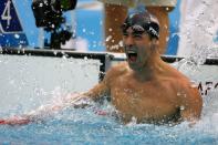 <p>Swimmer Michael Phelps has broken a slew of records, but in the 2008 Beijing Games he won the most gold medals for an individual athlete in one Olympics. He tied Mark Spitz’s record in a race that was won by a margin of 1/100th of a second, one of the closest finishes in history. (Getty) </p>