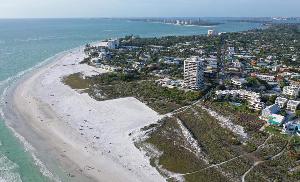 This stretch of Siesta Key Beach is near the Siesta Key Village shopping area.  Just two days after a circuit judge ruled last year that the Sarasota County Commission erred in allowing uncapped hotel development on Siesta Key, developers of proposed hotels on the barrier island held a preplanned meeting with county staff and discussed what would months later be described by a county attorney as a "legislative fix" to the hotel plans to go forward.