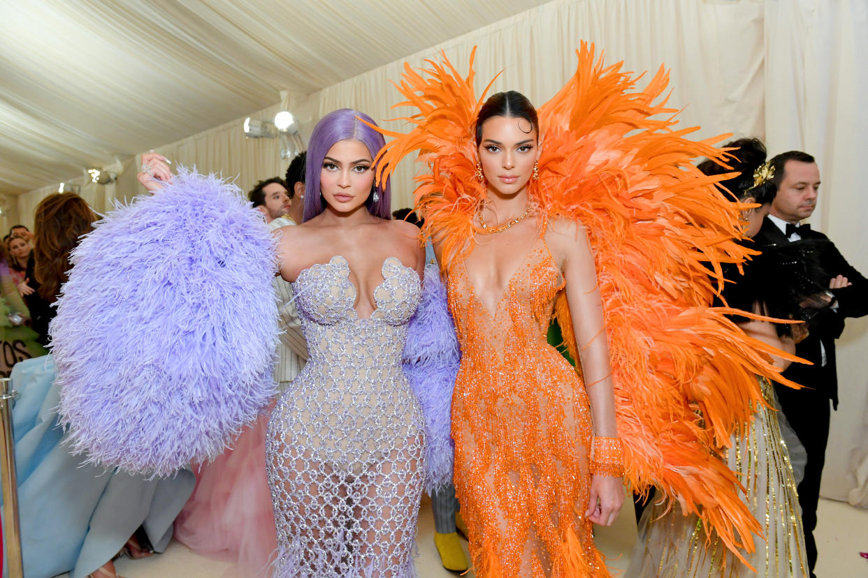Kylie (left) and Kendall (right) Jenner, pictured at the Met Gala in May 2019, are currently on holiday together. (Getty Images)
