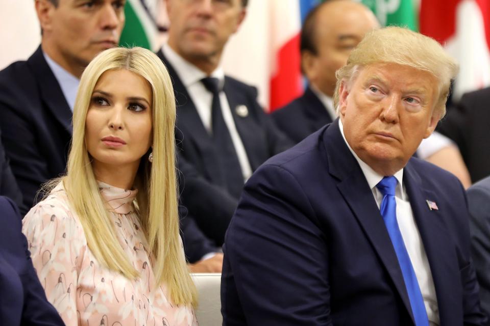 Advisor to the US President Ivanka Trump (L) sits next to her father US President Donald Trump during an event on the theme "Promoting the place of women at work" on the sidelines of the G20 Summit in Osaka on June 29, 2019. (Photo by Dominique JACOVIDES / POOL / AFP)        (Photo credit should read DOMINIQUE JACOVIDES/AFP/Getty Images)