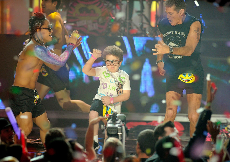 LOS ANGELES, CA - NOVEMBER 20:  Keenan Cahill (C) performs with LMFAO onstage at the 2011 American Music Awards held at Nokia Theatre L.A. LIVE on November 20, 2011 in Los Angeles, California.  (Photo by Kevork Djansezian/Getty Images)