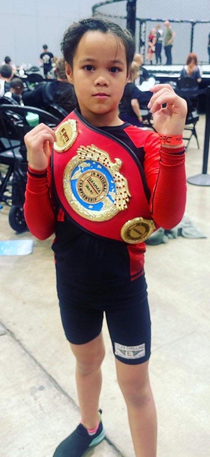 Bartlesville nine-year-old Alaina Stout captured the 8-9-year-old championship belt at the GAMMA Junior National tournament in April 2023 in Arkansas.
