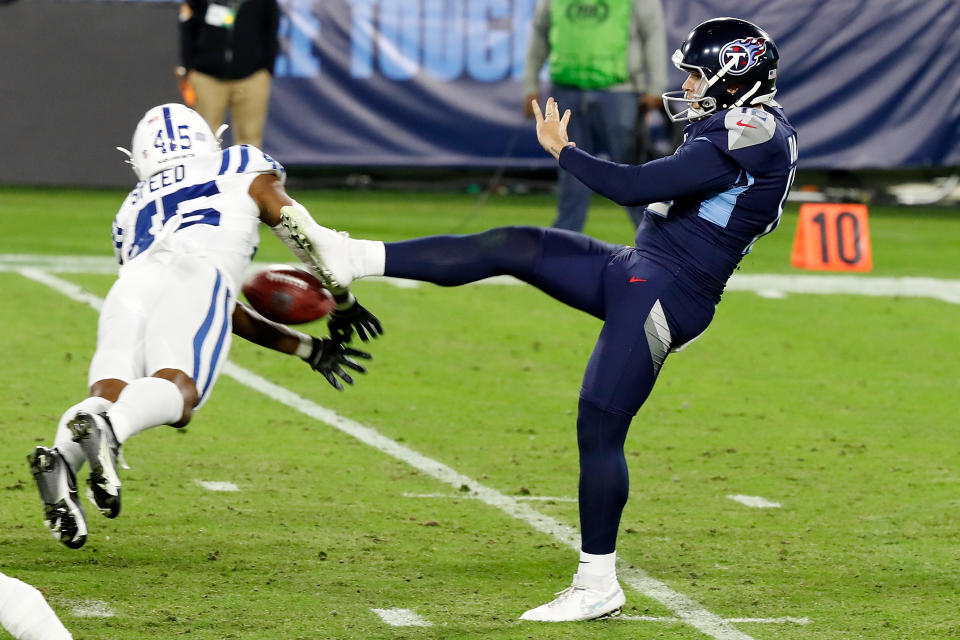 E.J. Speed of the Indianapolis Colts blocks a punt by Trevor Daniel of the Tennessee Titans during their NFL game on "Thursday Night Football."