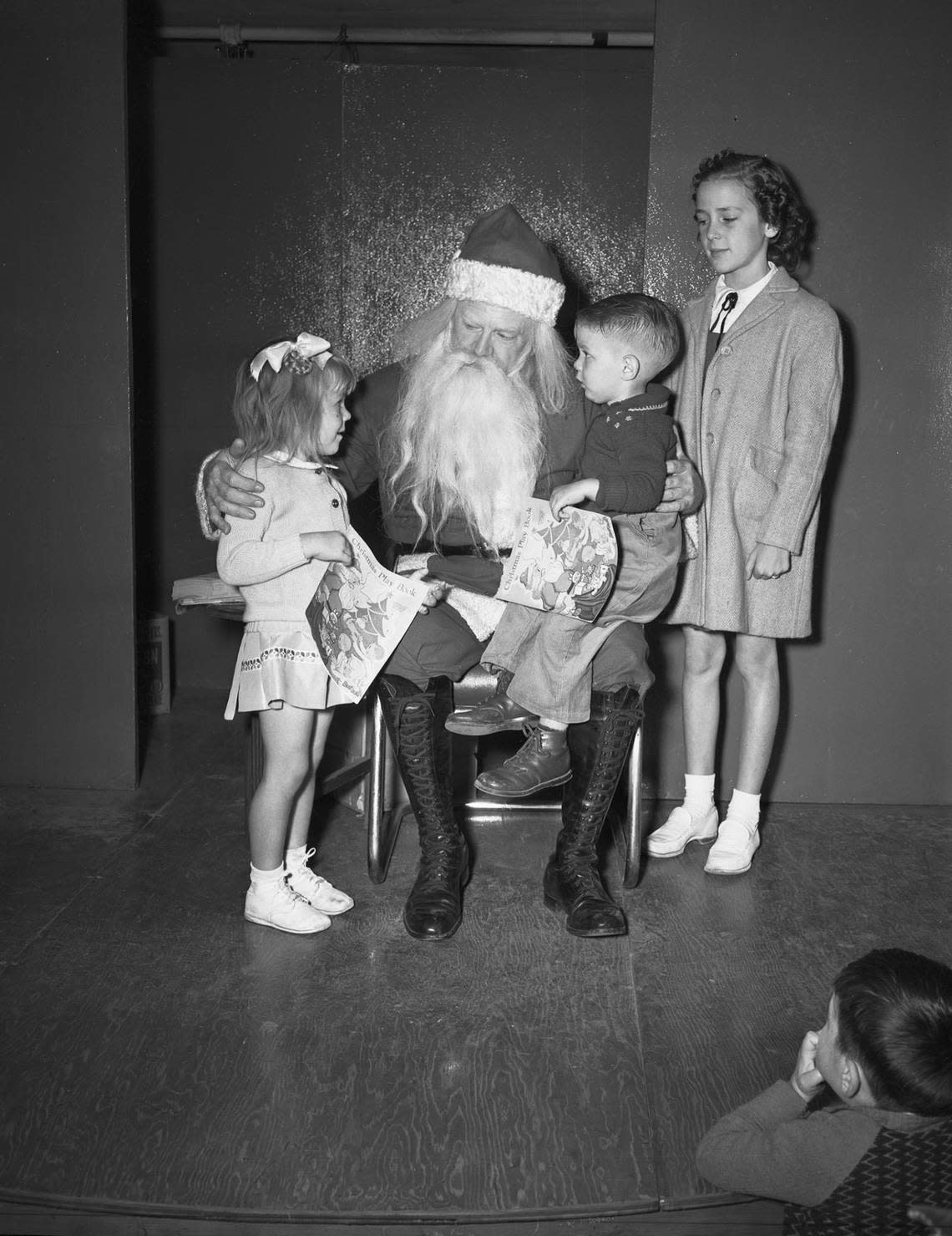 Nov. 29, 1946: Leonard’s department store’s Santa Claus holds young Christmas shopper Walder Gray McElroy on his knee while Lavalla Bailey and Nancy Ann Foster wait their turn.