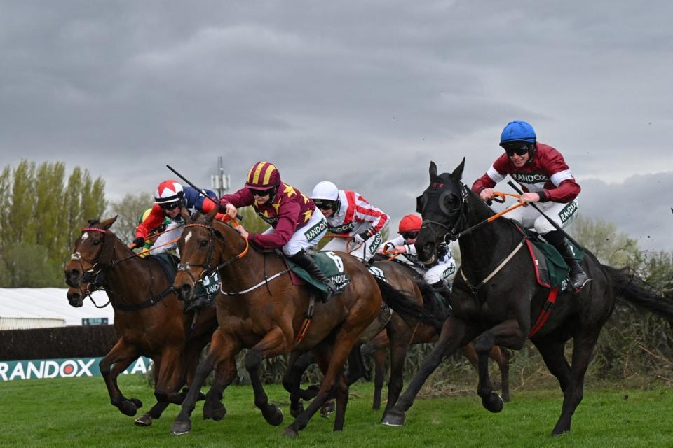 Rachael Blackmore and Minella Indo head to the front with one fence left to jump at the Grand National (AFP via Getty)