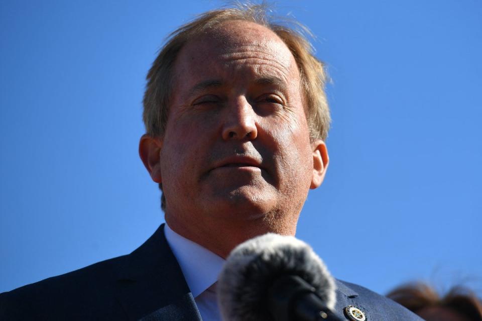 Texas Attorney General Ken Paxton wants to impose fines on companies that help staff access abortion care (AFP via Getty Images)