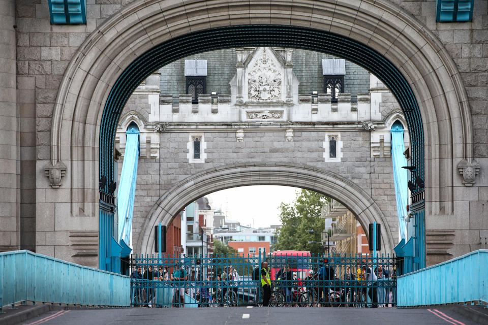 Pedestrians And Traffic Stuck On Tower Bridge