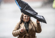A fan arrives in the heavy rain for the Premier League match at Bramall Lane between Sheffield United and AFC Bournemouth. (PA)