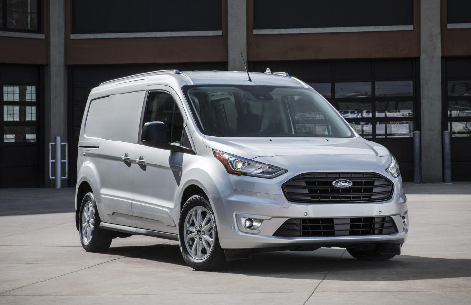 A silver 2019 Ford Transit Connect, a small commercial van.