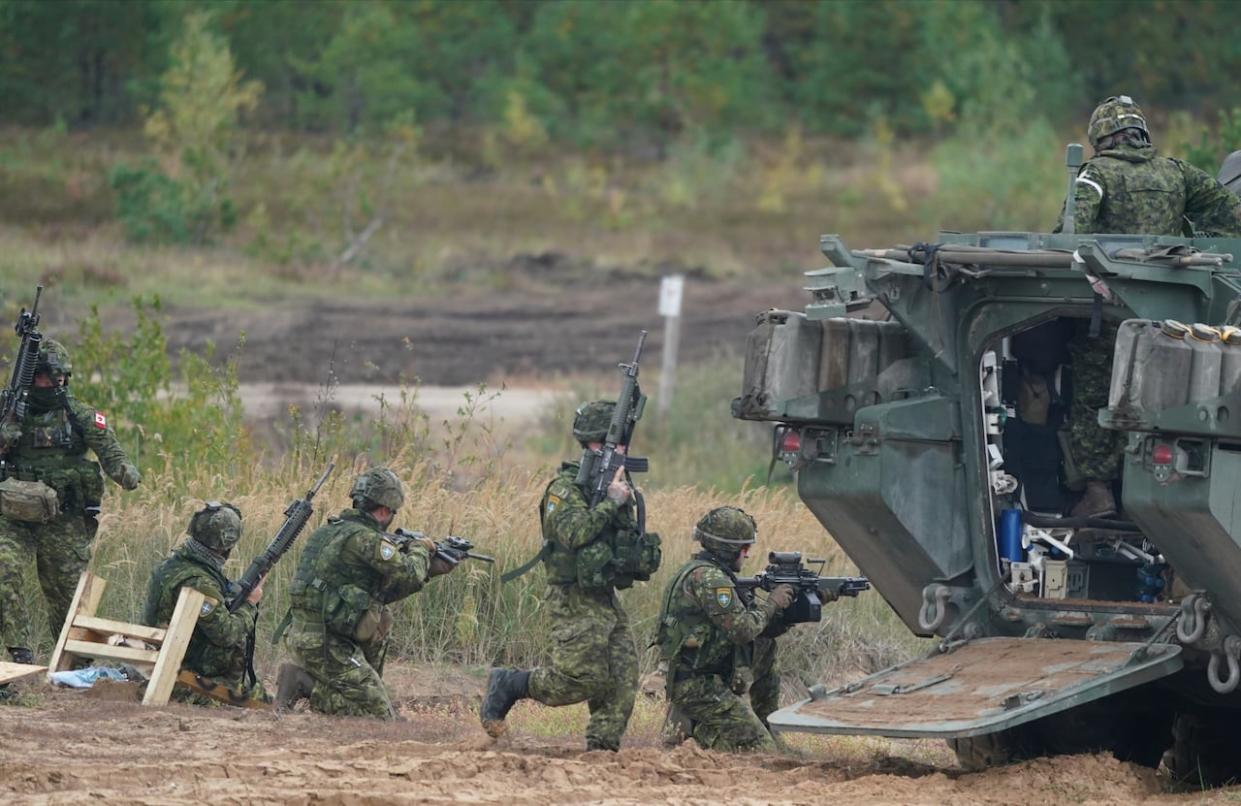 Canadian soldiers take part in NATO military exercises at a training ground in Kadaga, Latvia, on Sept. 13, 2021. (Roman Koksarov/The Associated Press - image credit)