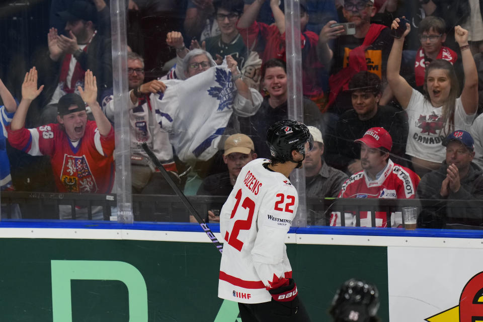 Canada's Dylan Cozens celebrates after scoring his sides second goal during the preliminary round match between Canada and Switzerland at the Ice Hockey World Championships in Prague, Czech Republic, Sunday, May 19, 2024. (AP Photo/Petr David Josek)