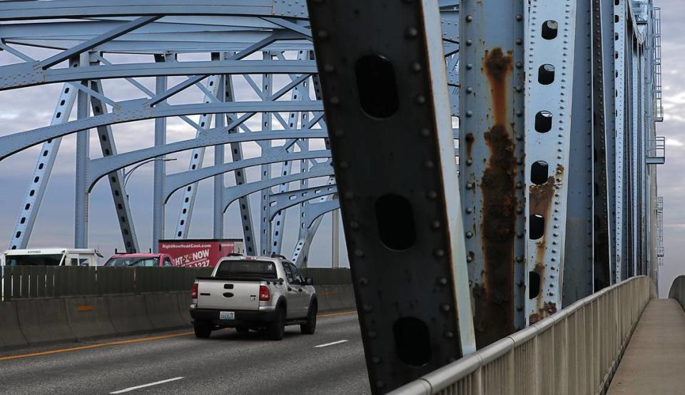 Faded paint and rust are showing on the girders of the four-lane blue bridge over the Columbia River, linking Pasco and Kennewick. The last time it was repainted was in 1995.