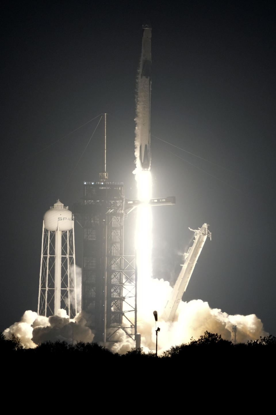 A SpaceX Falcon 9 rocket with the crew capsule Endeavour lifts off from pad 39A at the Kennedy Space Center in Cape Canaveral, Fla., Thursday, March 2, 2023. (AP Photo/John Raoux)