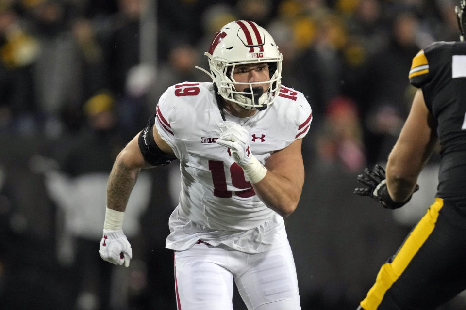 FILE - Wisconsin linebacker Nick Herbig rushes during the second half of an NCAA college football game against Iowa, Saturday, Nov. 12, 2022, in Iowa City, Iowa. The Pittsburgh Steelers selected Herbig in the fourth round of the NFL draft on Saturday, April 29, 2023. Herbig will join older brother Nate in Pittsburgh. Nate Herbig, a veteran offensive guard, signed with the Steelers in free agency last month. (AP Photo/Charlie Neibergall, File)