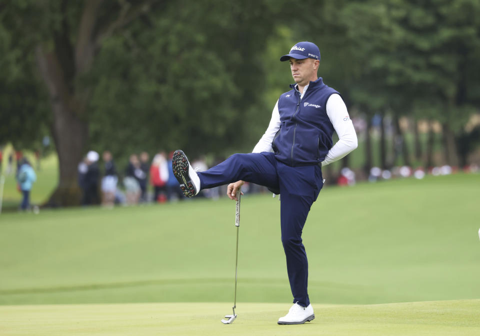 U.S golfer Justin Thomas reacts after missing a putt on the 9th green during the JP McManus Pro-Am at Adare Manor, Ireland, Tuesday, July, 5, 2022. (AP Photo/Peter Morrison)