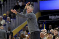 Golden State Warriors head coach Steve Kerr gestures to his team during the first half of an NBA basketball game against the Utah Jazz in San Francisco, Sunday, April 14, 2024. (AP Photo/Jed Jacobsohn)
