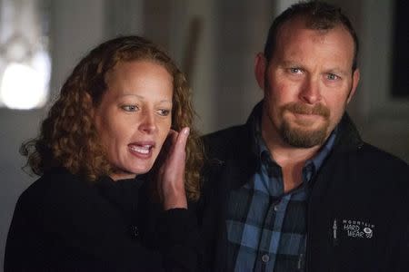 Nurse Kaci Hickox (L) and her boyfriend Ted Wilbur address the media during an informal meeting with the news media outside their home in Fort Kent, Maine October 29, 2014. REUTERS/Ashley L. Conti/Bdn