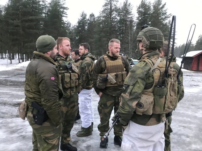 Norwegian Army Lieutenant-Colonel Grongstad talks to soldiers during training in Elverum