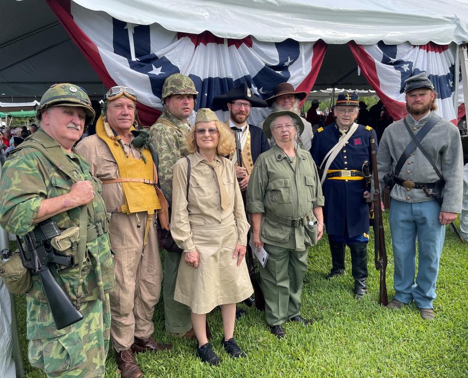 Neapolitan enactors at the 2023 Earl Hodges Memorial Day picnic on Monday, May 29, 2023, in Naples. From left: Jim Clark, US Maine Corps, Vietnam; Joe Gibson, US Army Air Corps, WWII; Bryan Thaggard, US Marine Corps, WWII; Tara Gibson, US Army Air Corps; Jacob Winge, Continental Army, American Revolution; Sandy Clark, US Marine Corps, Vietnam; Jeffrey Wait, Florida Cattle Guard Battalion, Civil War; Matthew McCague, 47th NY Division, Civil War; Billy Pascucci, Confederacy, Civil War.