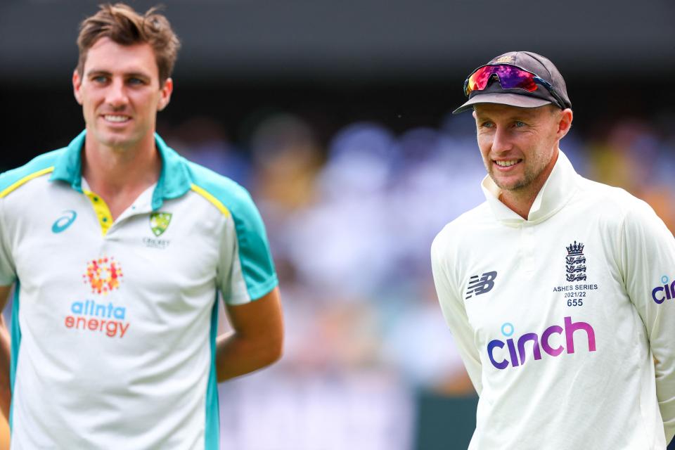 England captain Joe Root (pictured right) and Australian captain Pat Cummins (pictured left) wait to be interviewed.