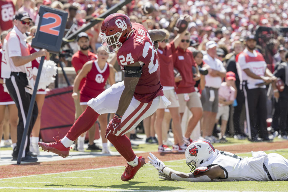 Oklahoma running back Marcus Major (24) runs for a touchdown against Arkansas State during the first half of an NCAA college football game, Saturday, Sept. 2, 2023, in Norman, Okla. (AP Photo/Alonzo Adams)